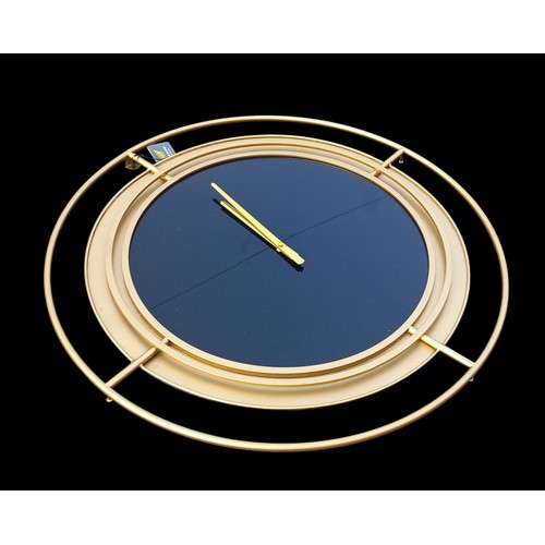 444 - A NEW GILT FRAMED WALL CLOCK 27