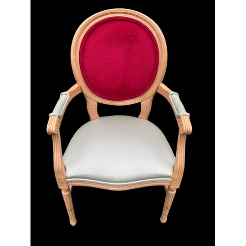 6 - A SHAPED ARMCHAIR IN A FRENCH STYLE