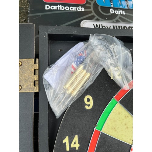 41 - A BOXED DART BOARD (UNUSED) WITH DARTS