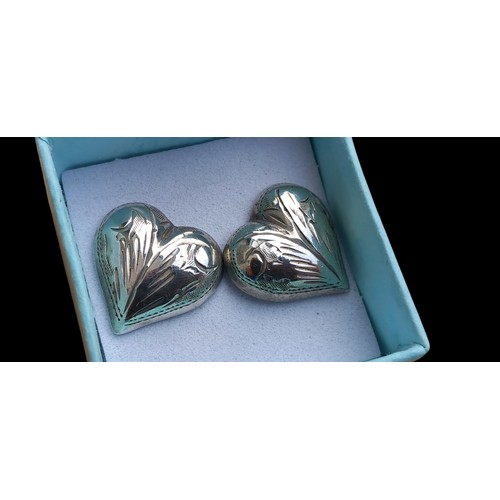 157 - A LARGE ORNATE PAIR OF SILVER HEART EARRINGS