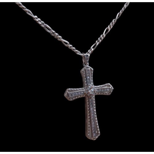 161 - A STUNNING GEM SET SILVER CROSS ON A SILVER CHAIN