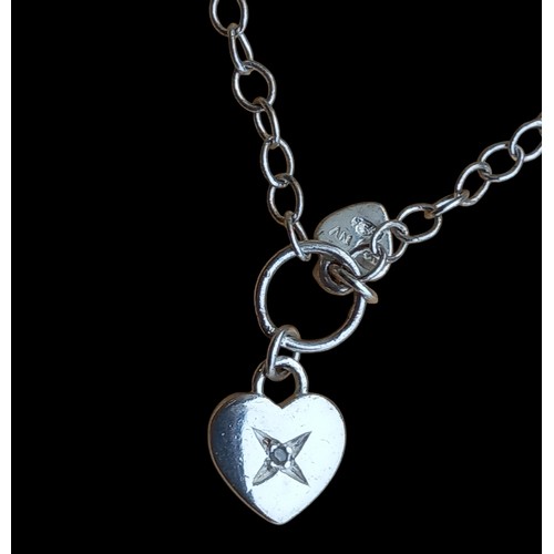 192 - A SILVER WRIST CHAIN WITH DOUBLE HEART FOB