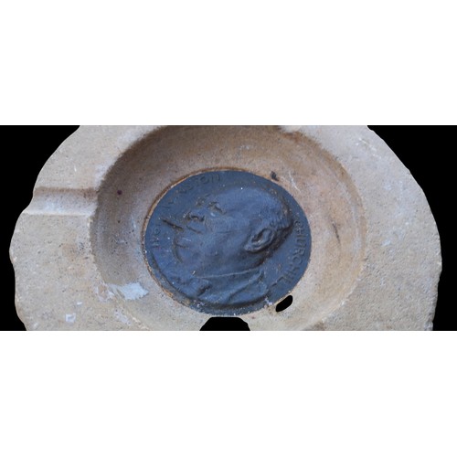 193 - A BRONZE CHURCHILL PLAQUE INBEDDED IN A STONE ASHTRAY