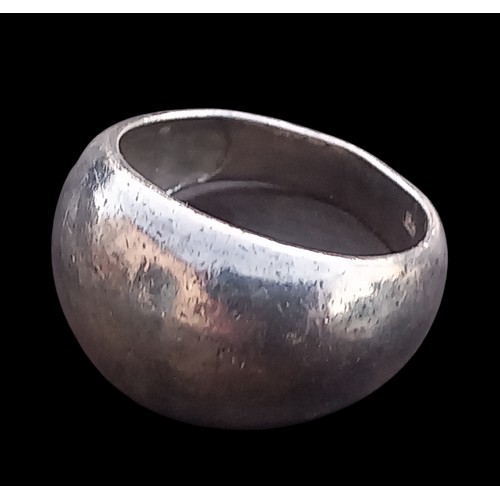 228 - A LARGE SILVER RING