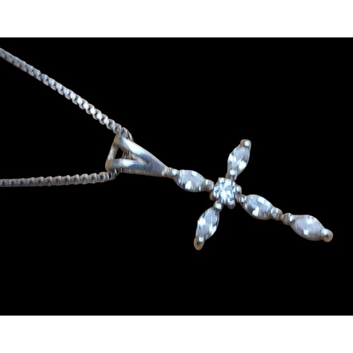 246 - A GEM SET SILVER CROSS ON SILVER CHAIN