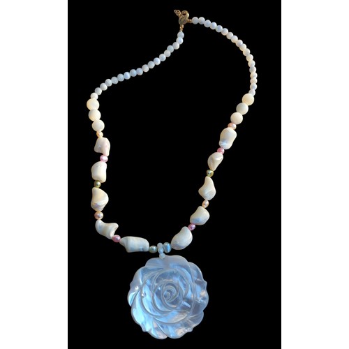 200 - FLOWER MOTHER OF PEARL PENDANT AND SHELL NECKLACE