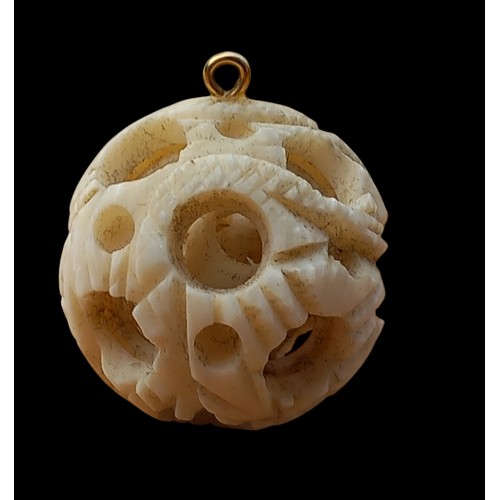 254 - GOLD MOUNTED PUZZLE BALL PENDANT