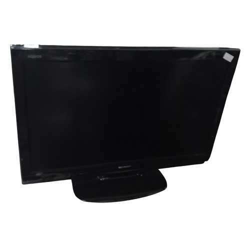 257 - A SHARP AQOUS  FLATSCREEN TV WITH REMOTE