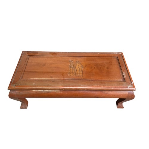 352 - ORIENTAL CARVED TABLE UNDER GLASS