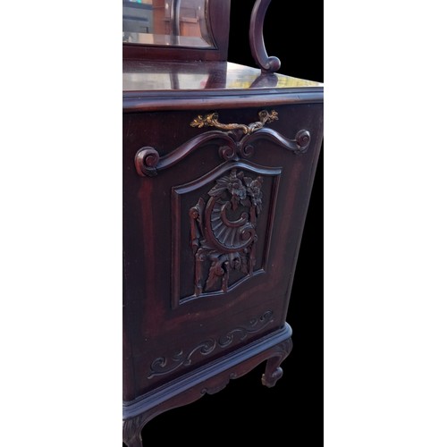 354 - A HEAVELY CARVED FALL FRONT COAL CABINET WITH SHOVEL AND MIRRORED BACK