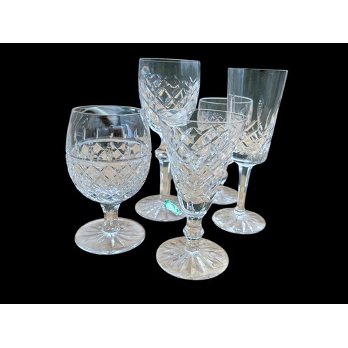 414 - A MIXED LOT OF 5 WATERFORD GLASSES