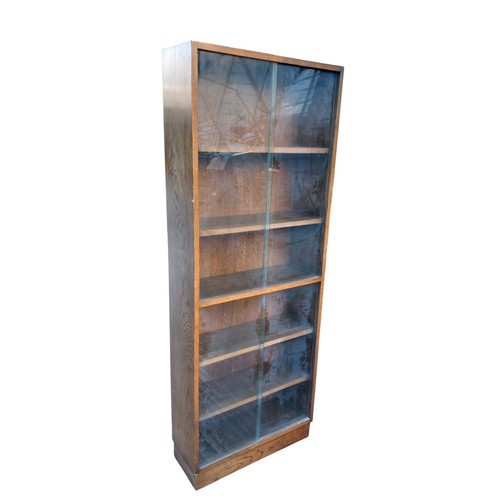 402 - TALL VINTAGE OAK BOOKCASE WITH SLIDING DOORS