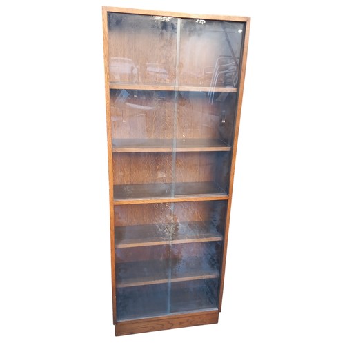 402 - TALL VINTAGE OAK BOOKCASE WITH SLIDING DOORS