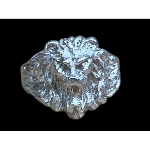 603 - A ROARING LION SILVER RING