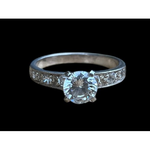 615 - A SILVER GEM SET SILVER SOLITAIRE RING