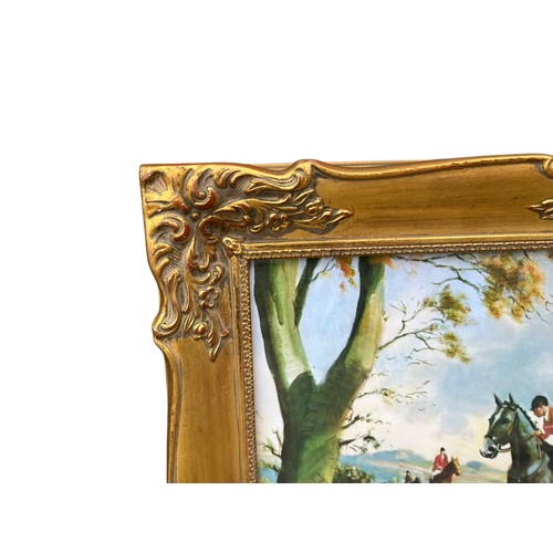 166 - AN ORNATE GILT FRAMED HUNT SCENE