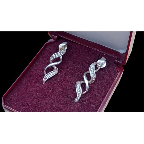 196 - PAIR OF SILVER TWIST EARRINGS