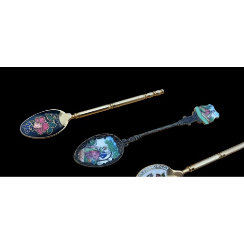 205 - 4 SILVER GILT AND ENAMEL SPOONS