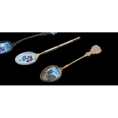 205 - 4 SILVER GILT AND ENAMEL SPOONS