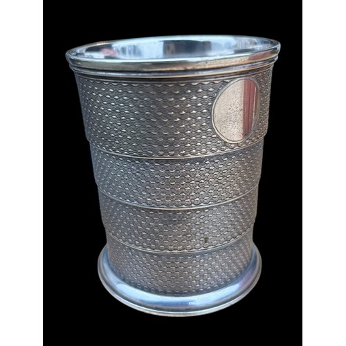 524 - A COLLAPSABLE PLATED TODDY CUP