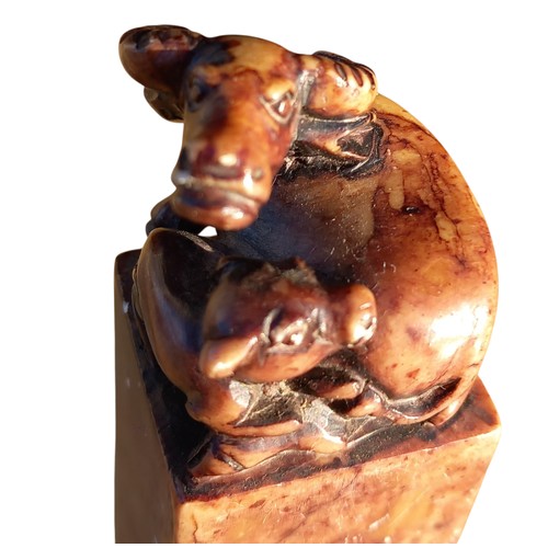 527 - BEAUTIFULY CARVED WATER BUFFALO AND CALF WITH INSCRIPTION ON BASE