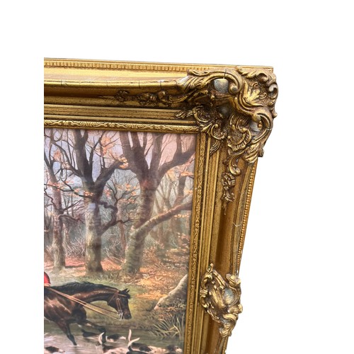 771 - A LARGE ORNATE GILT FRAMED HUNT SCENE OILOGRAMME