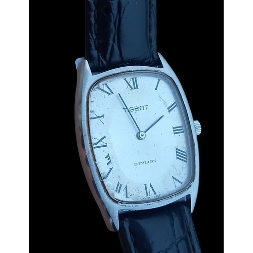 284 - A TISSOT STYLIST WATCH WITH A NEW STRAP IN P.W.O