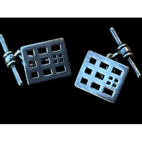 287 - A PAIR OF SILVER MACKINTOSH CUFFLINKS