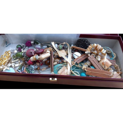 804 - A BOX OF COSTUME JEWELLERY