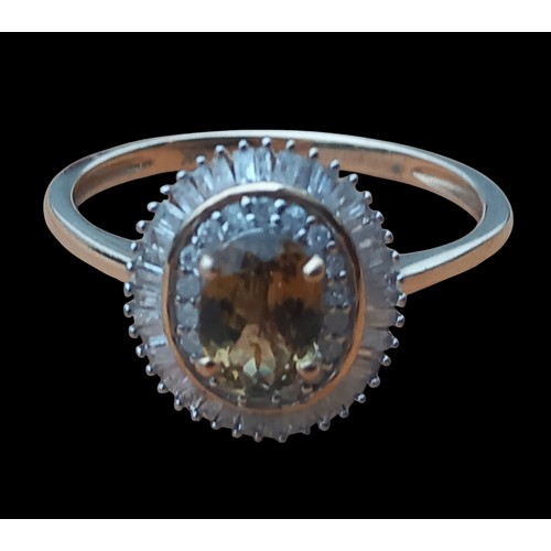 643 - A BEAUTIFUL 9ct GOLD CITRINE AND DIAMOND RING