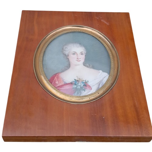 644 - A HAND PAINTED FRAMED MINITURE OF A LADY