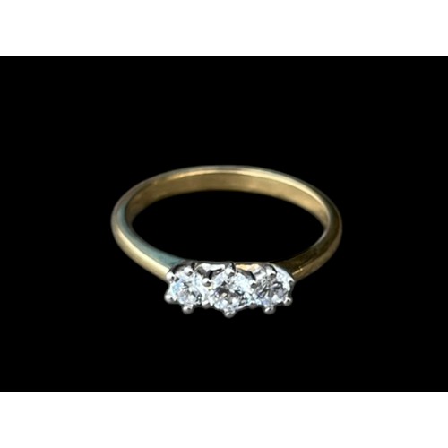 663 - A GOLD ON SILVER  3 STONE RING