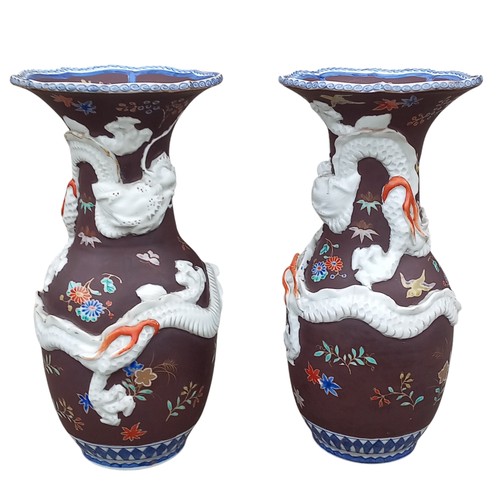 665 - A PAIR OF BEAUTIFULLY HANDPAINTED ORIENTAL VASE WITH DRAGONS OVERLAY MARKINGS TO BASE 12