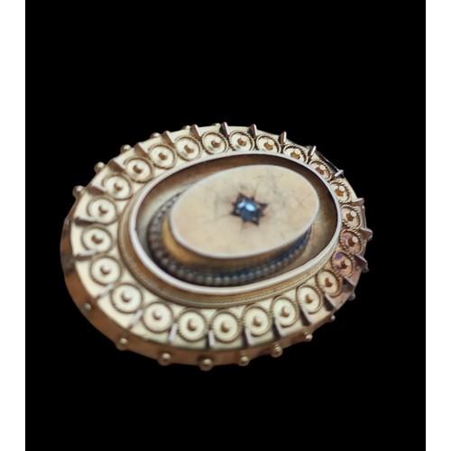 710 - A VICTORIAN GOLD MOURNING BROOCH  FILIGREE WORK SET WITH DIAMONDS