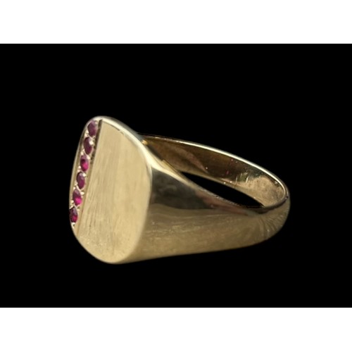 688 - A GENTS 9ct GOLD RING SET WITH 6 RUBIES size U