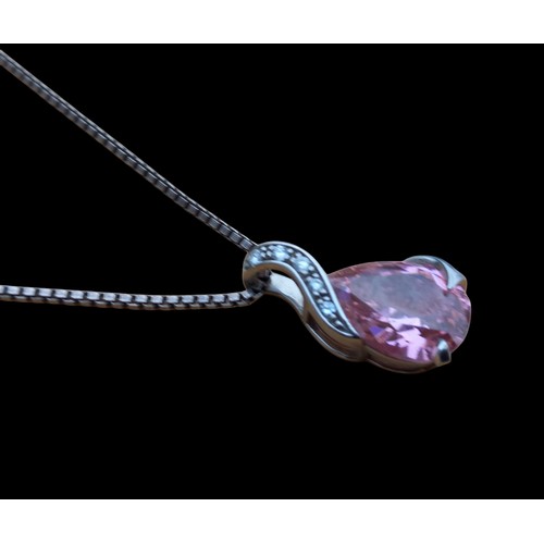 329 - A SILVER PINK AND WHITE CRYSTAL PENDANT ON SILVER CHAIN