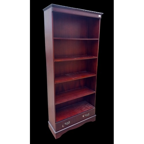 405 - A MAHOGANY ROPE EDGED SHELVING OVER DRAWER