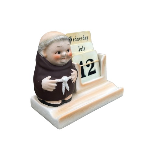 410 - A HUMMEL CALANDER DESK TIDY