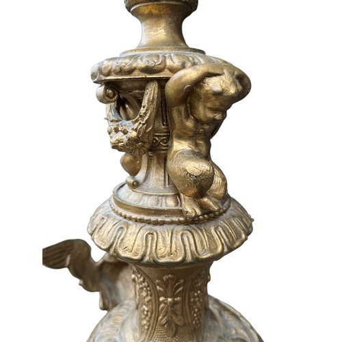 481 - AN EARLY ORNATE BRONZE TABLE LAMP WITH SWAN HEADS