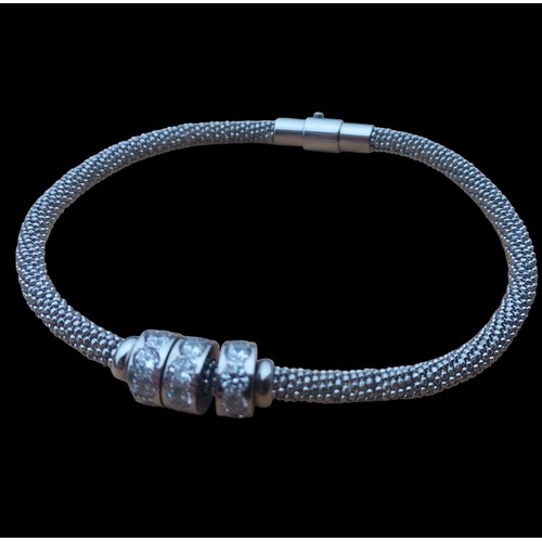 500 - 2 SILVER BRACELET 1 BY INFINITY BRAND WITH 3 MOVING STONE SET RINGS AND AN 18ct PLATED BRACELET SET ... 