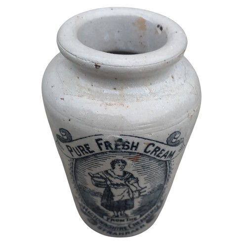 503 - AN ADVERTISNIG CREAMWARE POTEERY BOTTLE (STRANRAER)