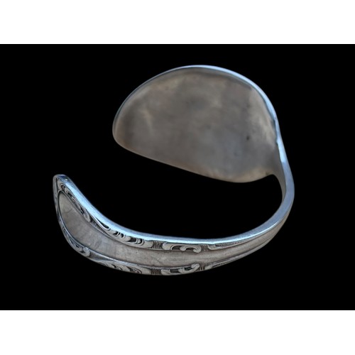 347 - AN UNUSUAL SILVER BANGLE MADE FROM A SPOON