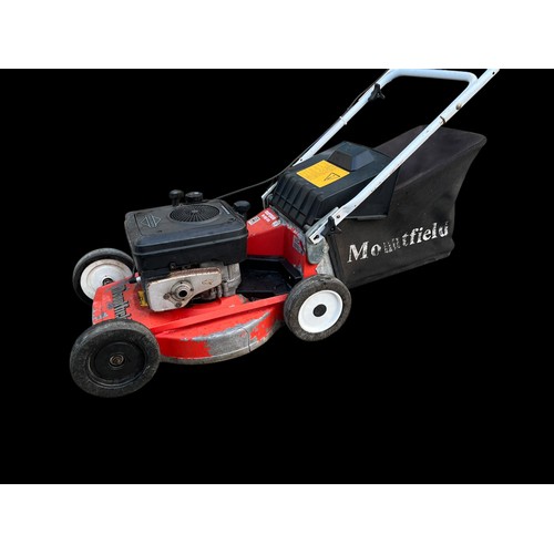 463 - A PETROL LAWN MOWER BY MOUNTFIELD WITH BRIGGS & STRATON ENGINE