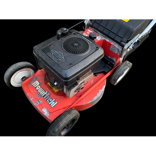 463 - A PETROL LAWN MOWER BY MOUNTFIELD WITH BRIGGS & STRATON ENGINE