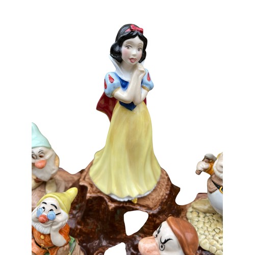 485 - A ROYAL DOULTON BESWICK SNOW WHITE AND 7 DWARF SET COMPLETE WITH STAND AND BOXES