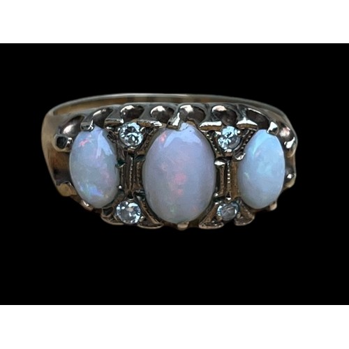 690 - A 9CT GOLD OPAL & DIAMOND RING