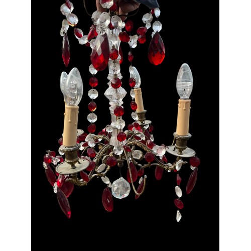 766A - A RED AND CLEAR GLASS CHANDALIER BACCARAT STYLE