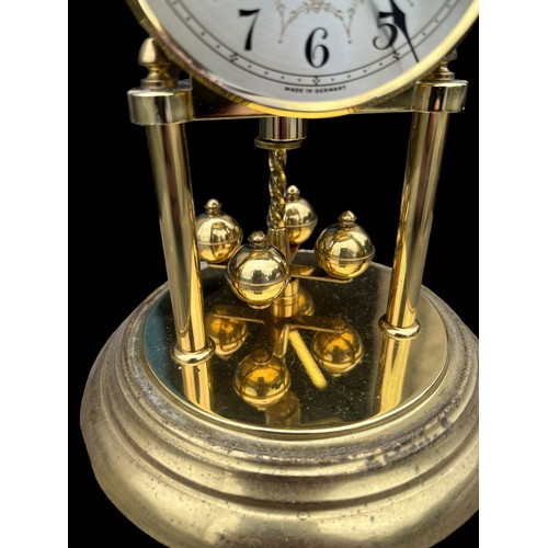 34 - A GLASS DOMED ANNIVERSARY CLOCK