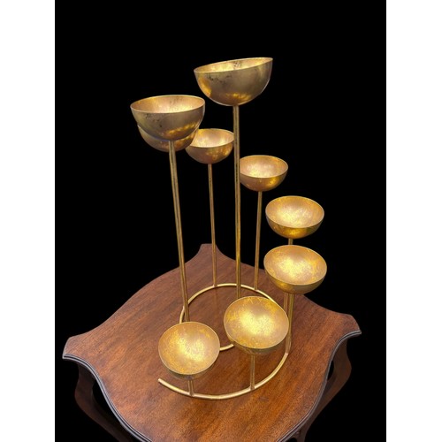 98 - A MULTI TIER (9) SPIRAL SHAPED GILT FINISH CANDLE HOLDER