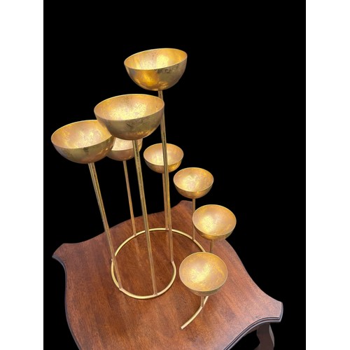 98 - A MULTI TIER (9) SPIRAL SHAPED GILT FINISH CANDLE HOLDER